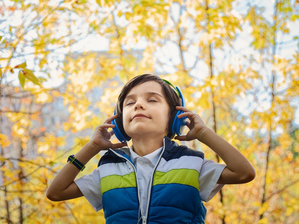 kid listening to music