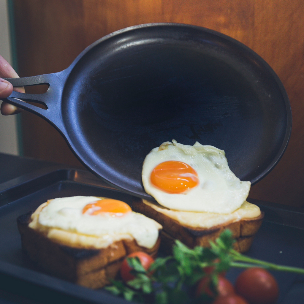 My 2 year old well used carbon steel searing pan. This is how it looks. Not  jet black, not perfect but it's a workhorse in my kitchen and so are the  other