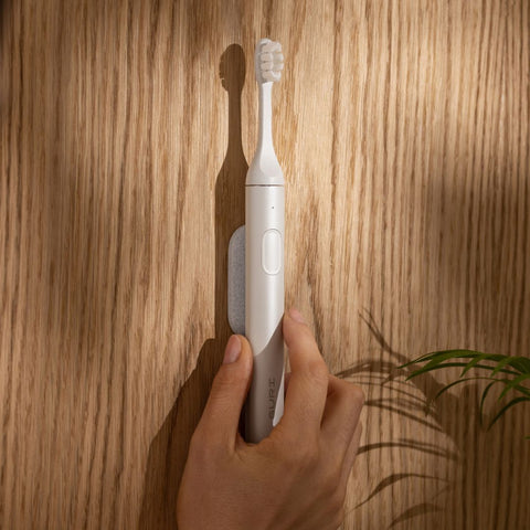 Suri sustainable electric toothbrush with mirror mount