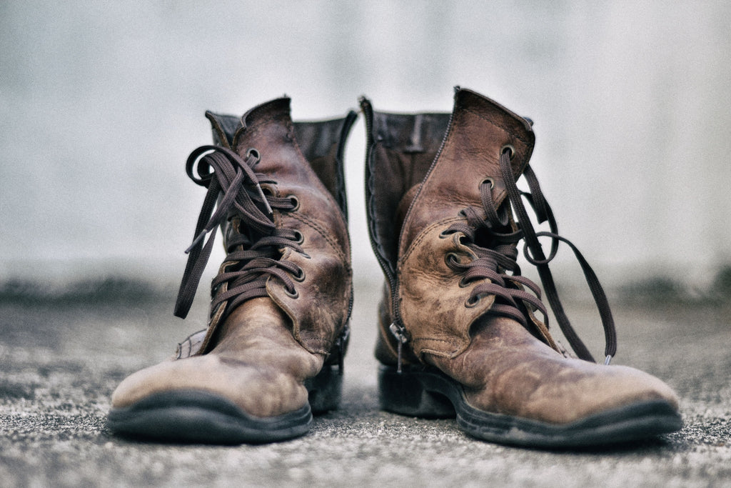 old, cheap pair of brown boots