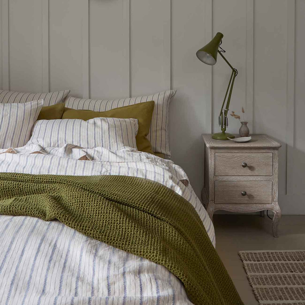 Dusk Blue Ticking Stripe and Botanical Green Linen Bedding with a Botanical Green Waffle Throw 