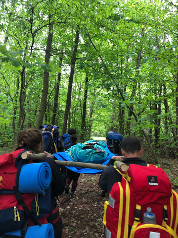 Carrying litter in Wilderness setting