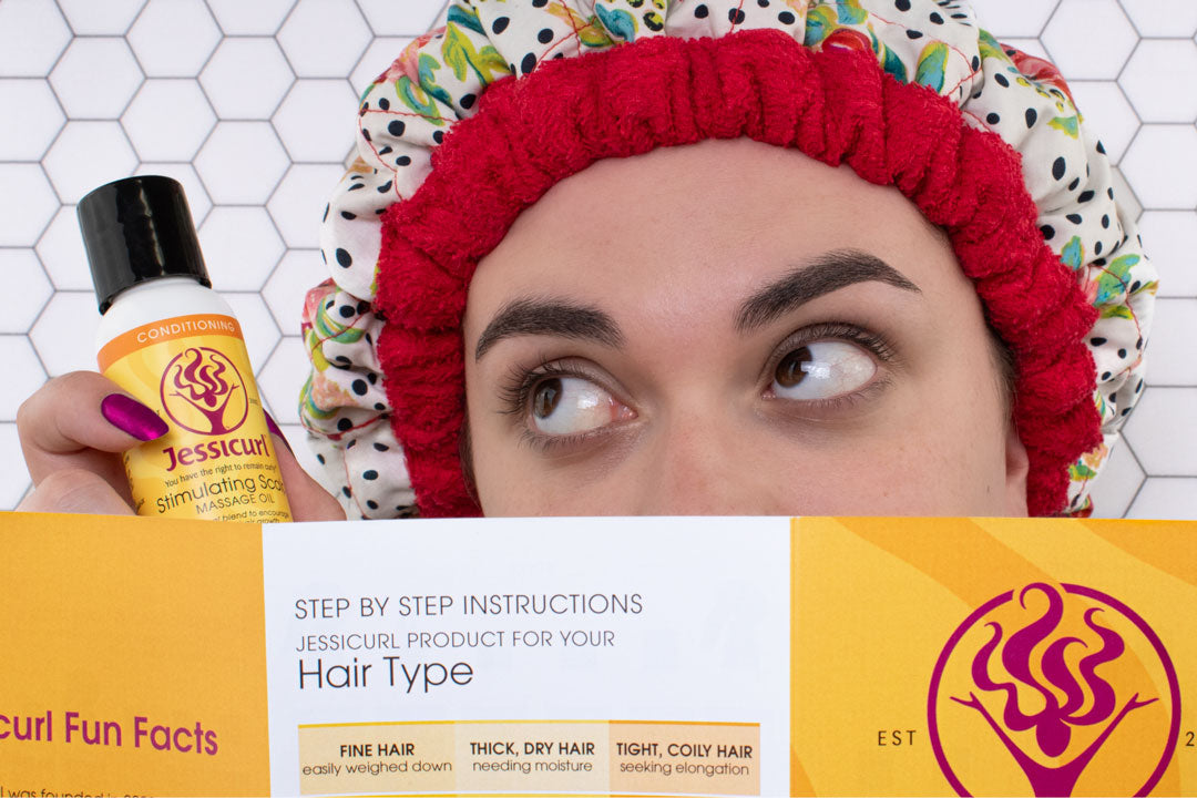 woman in heat camp with pamphlet covering half her face holding and looking at a bottle of product