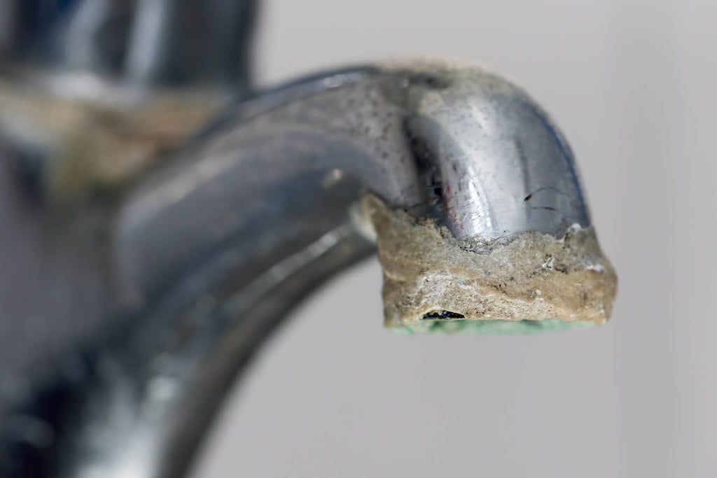 limescale on faucet
