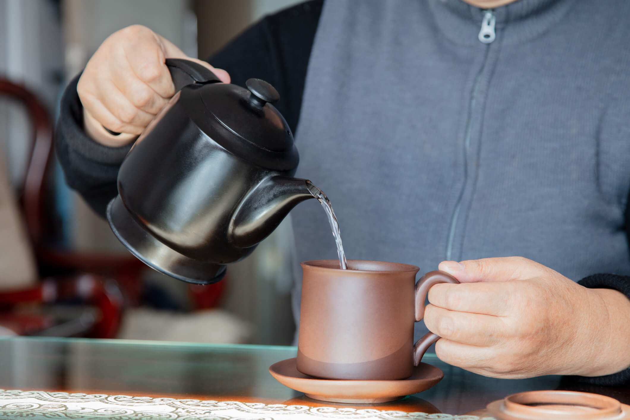 pouring water for tea