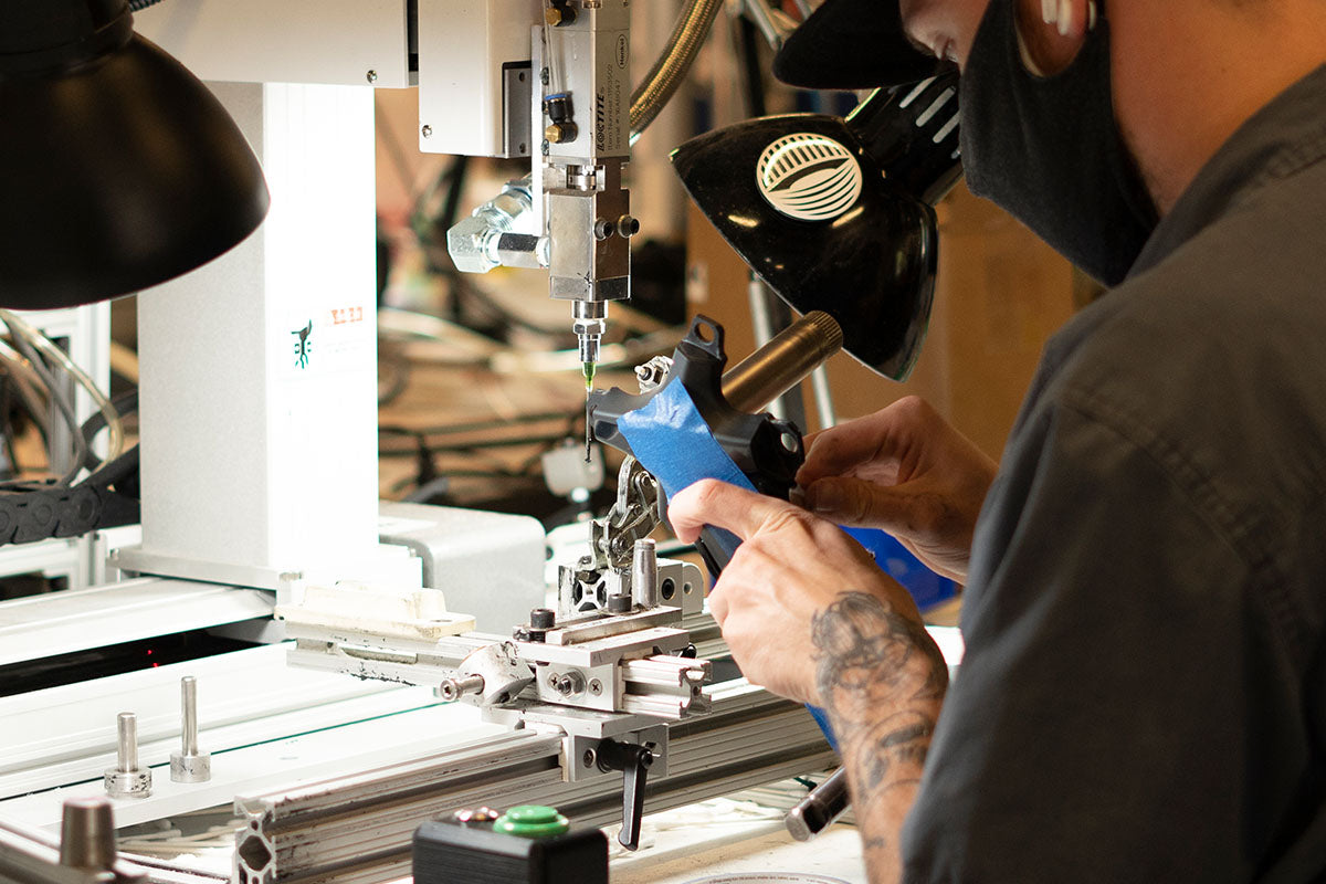 Stages factory technician working on a power meter