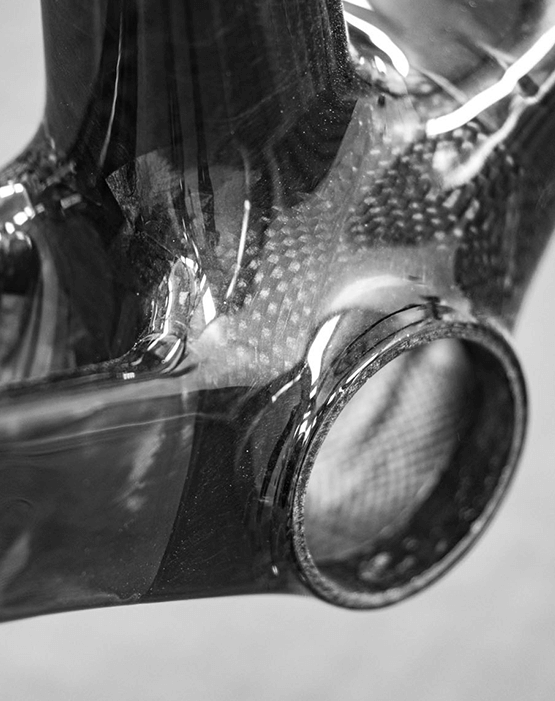 Closeup of carbon fibre layup on the bottom bracket of the ENVE Melee bike frame