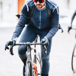 Smiling male cyclist wearing Castelli Aero Bib Shorts and Aero Jersey