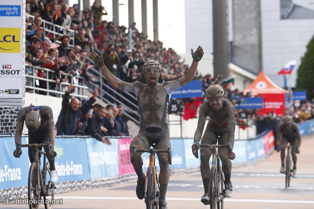 Sonny Colbrelli raises his arms in victory as he wins Paris-Roubaix 2021