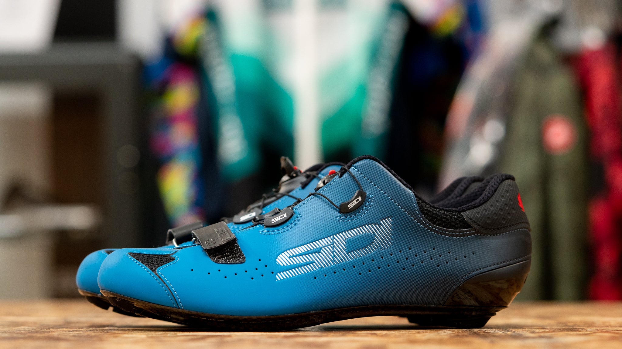 Side view of blue Sidi Sixty road cycling shoes 