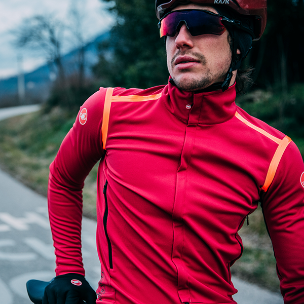 Male cyclist posing on bike outdoors wearing Castelli Perfetto RoS Long Sleeve Jacket