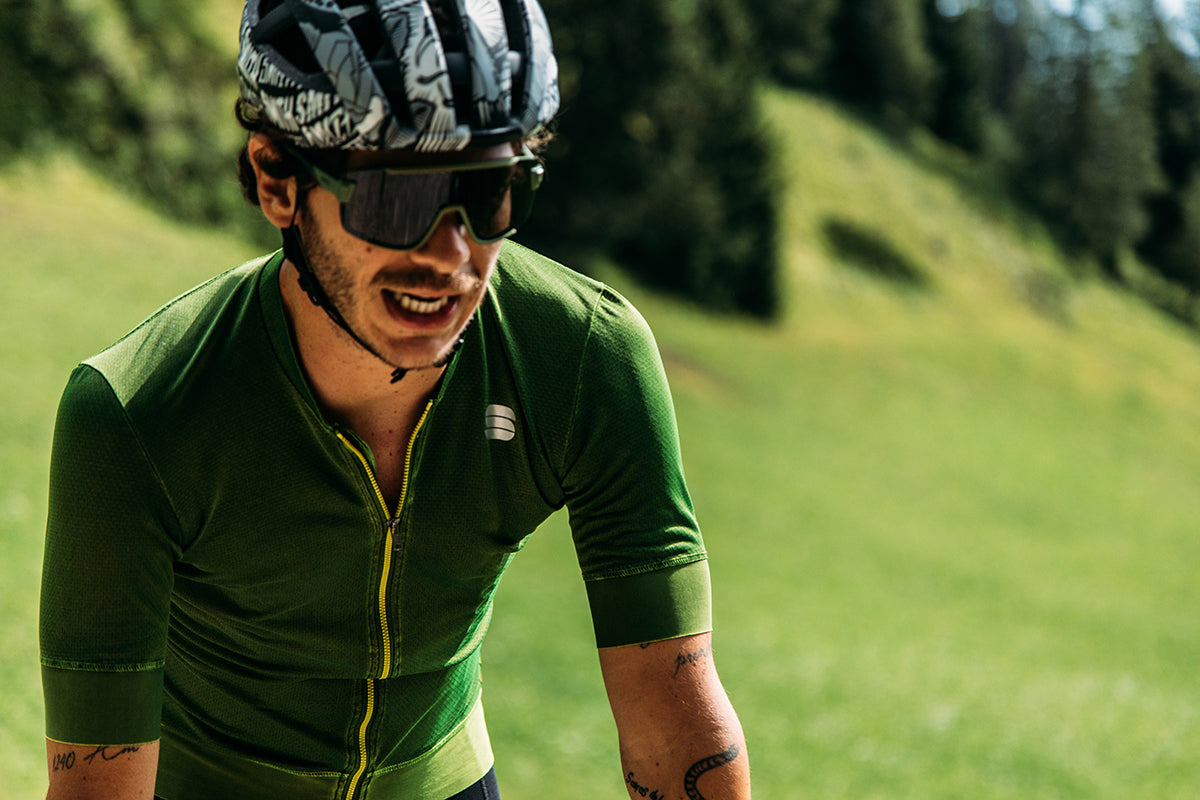 Sportful Monocrom Green Jersey Photo of cyclist wearing Sportful Monocrom jersey with soft focus background
