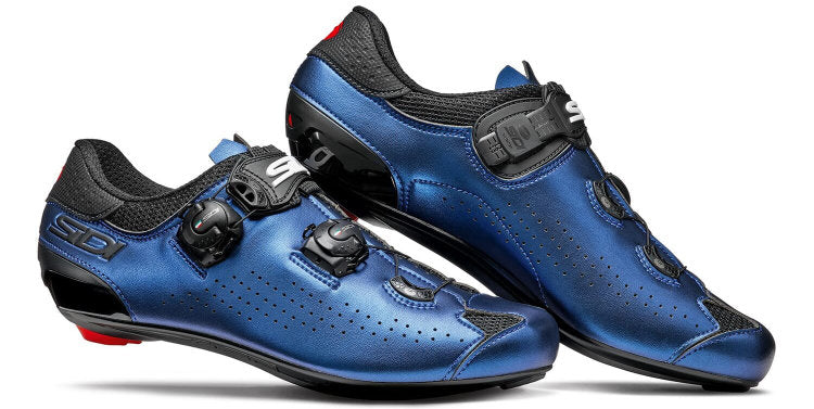 Side view studio shot of a pair of iridescent blue  Genius 10 road shoes