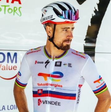 Top half shot of Peter Sagan in a Sportful TotalEnergies jersey with World Champion rainbow trim