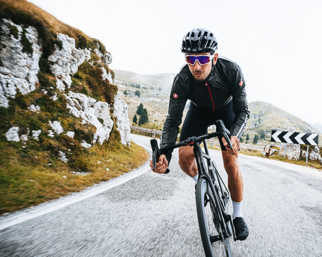 Man riding bike in Sportful Super Jacket