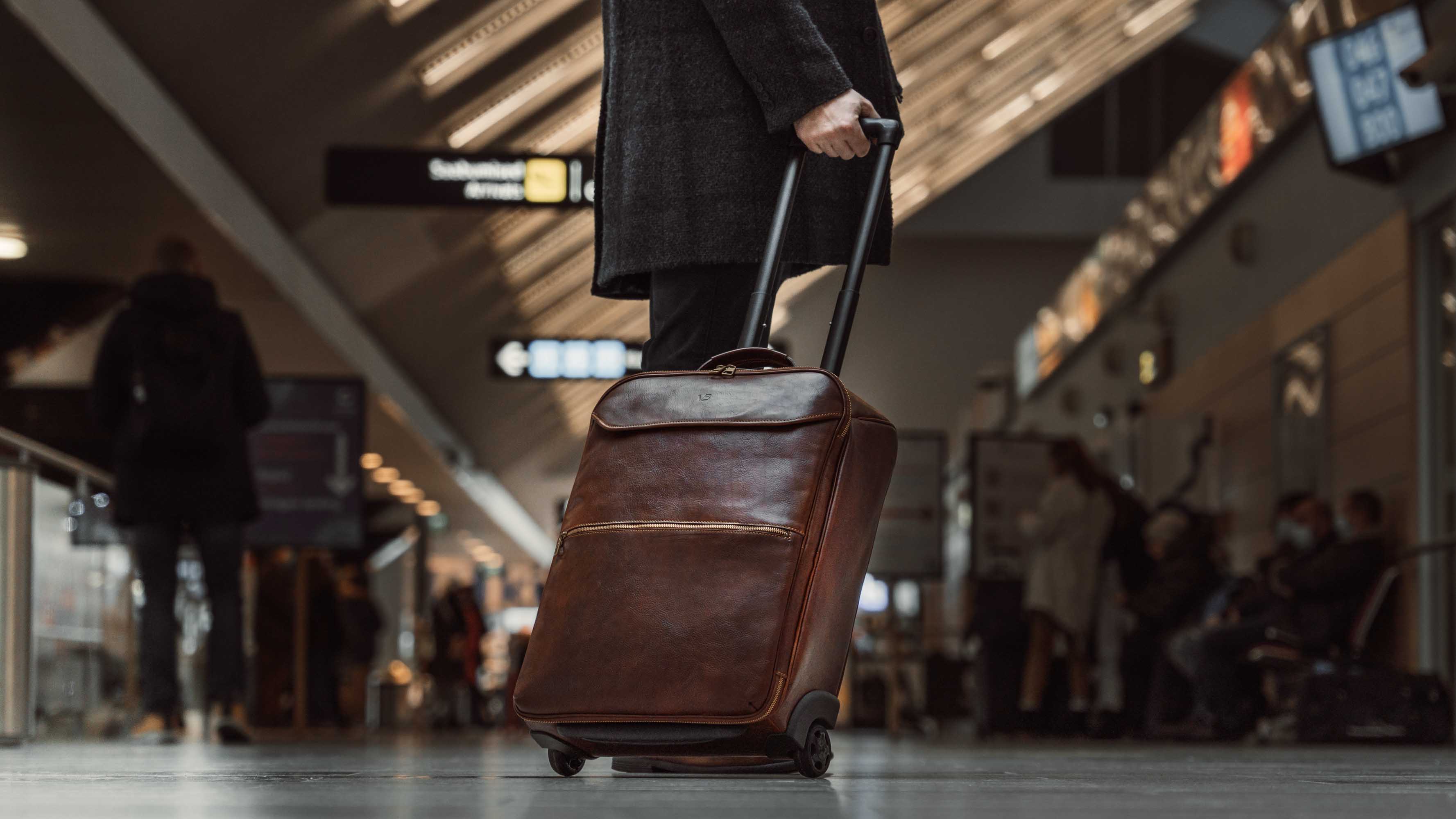 Leather Carry On Luggage with Wheels for | Small Rolling Cabin Bag with 16-inch Laptop Sleeve | Personalized Wheeled Business Travel Bag in Brown, Black, or Tan