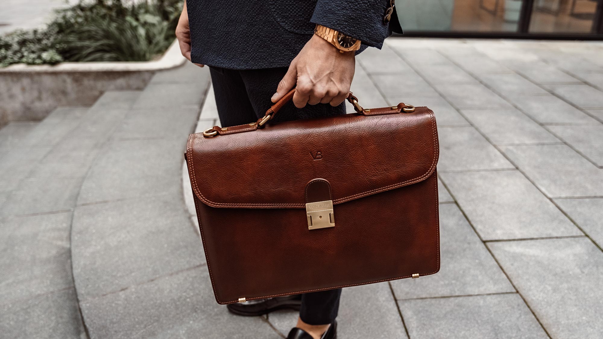 Men's one gusset briefcase, in gold grained leather. W…