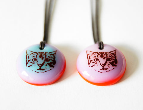 cute tabby cat face pendant necklaces in bright blue, pink and red recycled glass