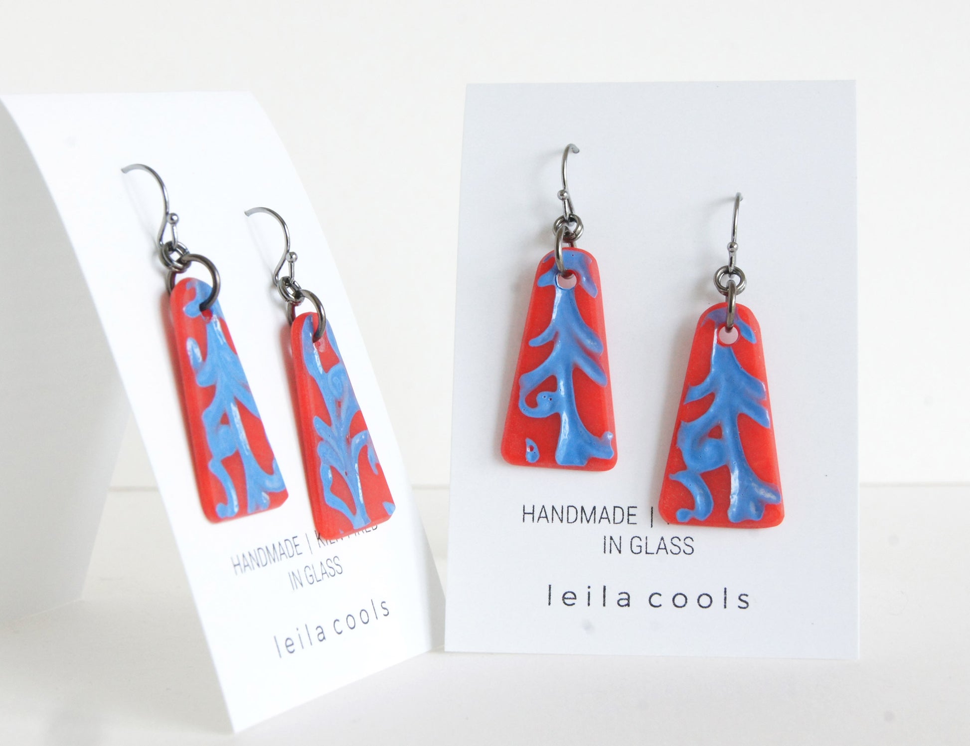 red and blue vine design earrings