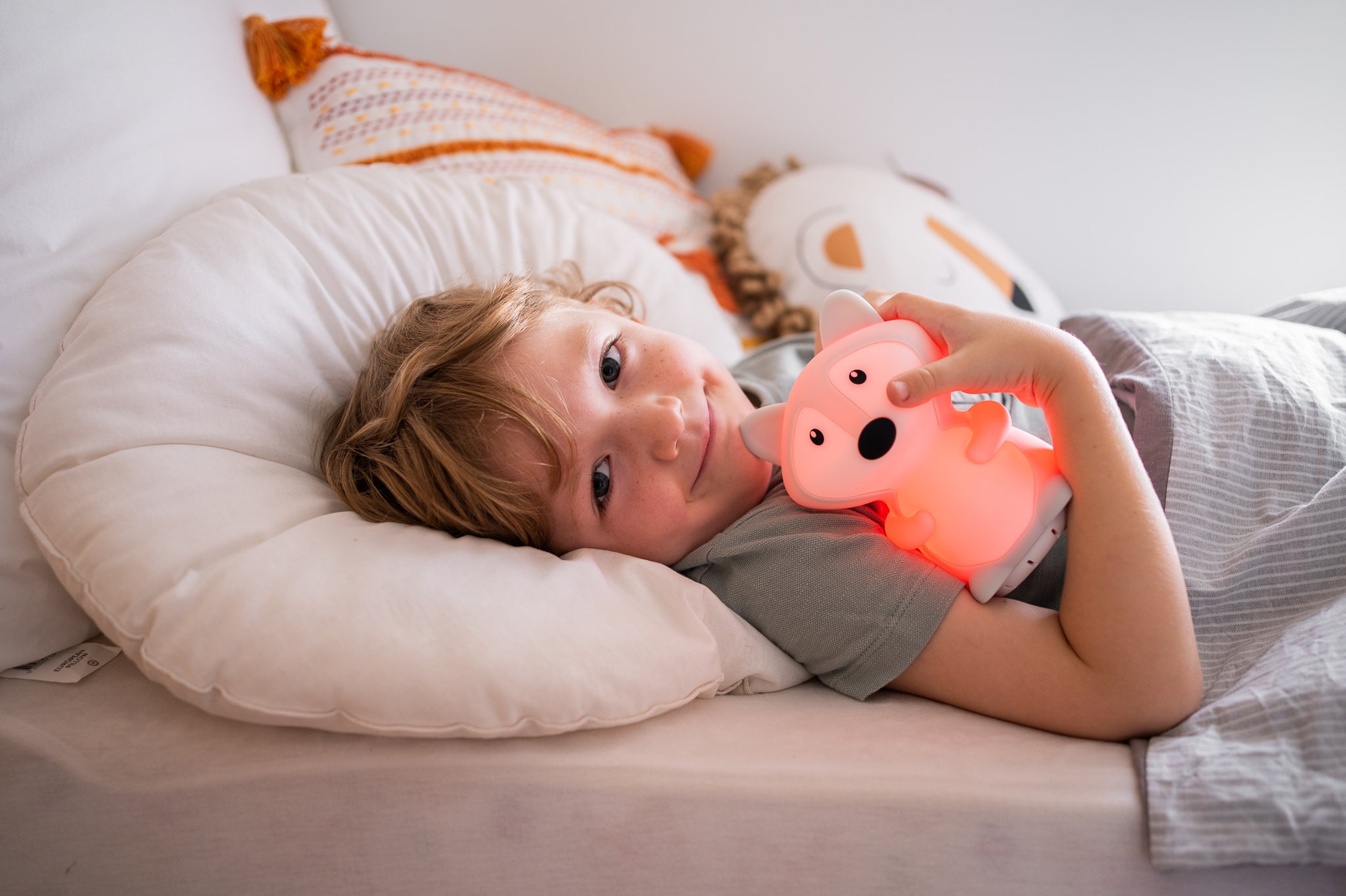 a boy with his gift night light