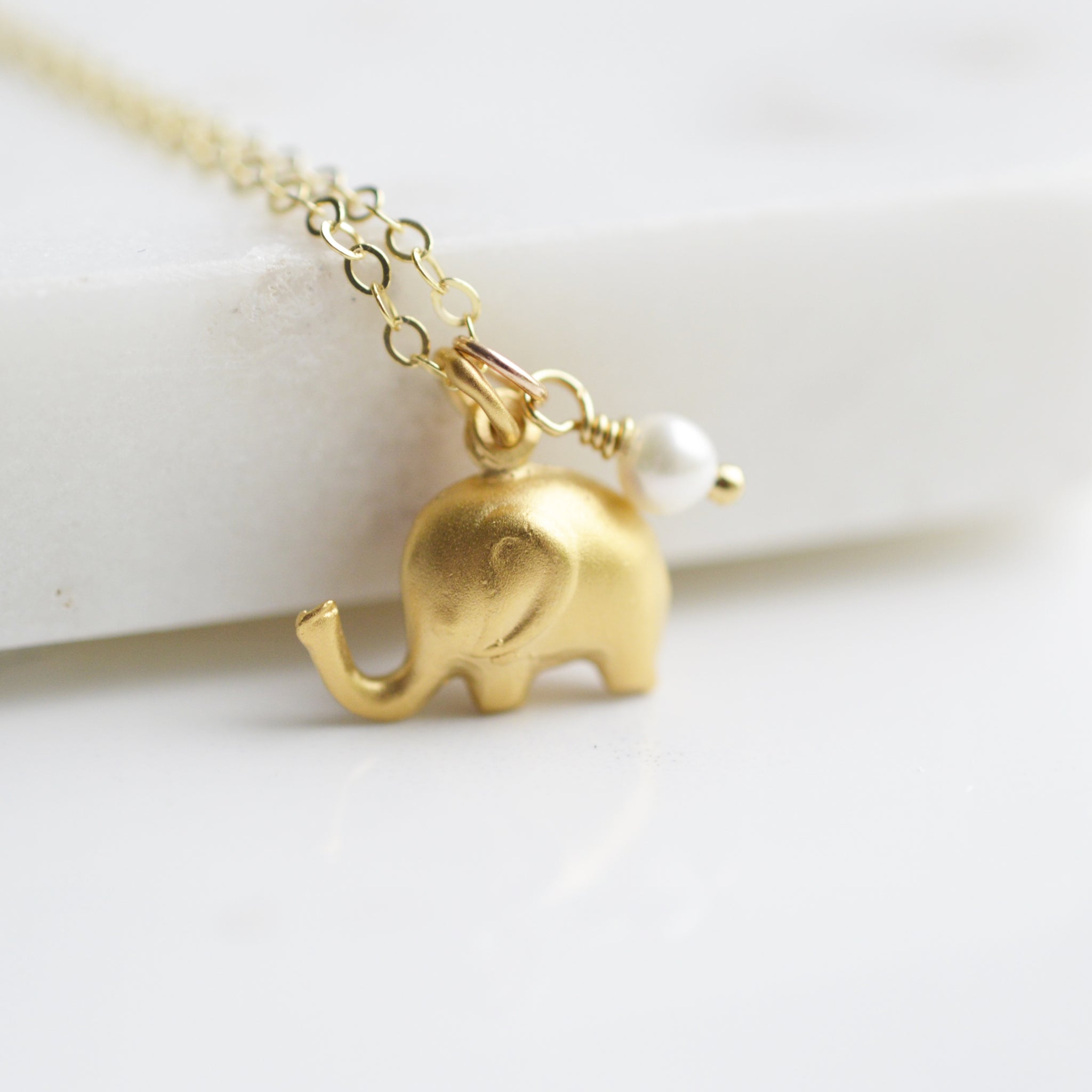 elephant gold necklace