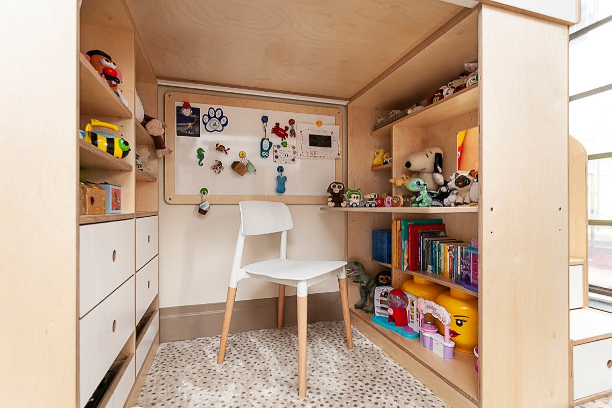 Cozy children’s study space with desk, chair, shelves