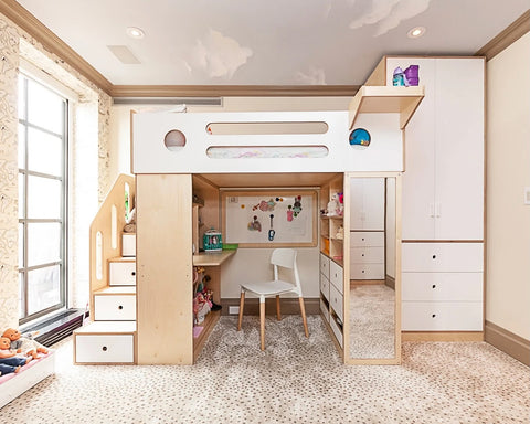 A room with a bunk bed and a desk