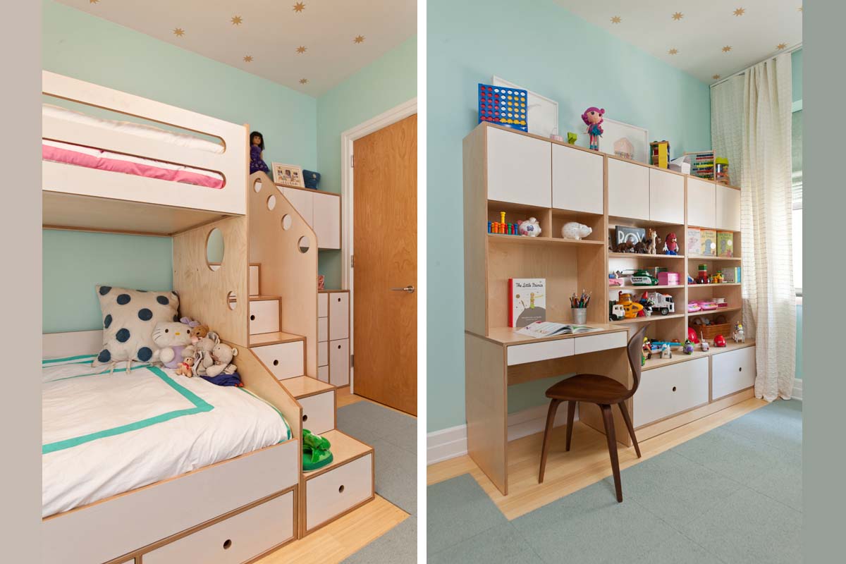 Child's room with aqua walls, a bunk bed setup, ample storage, and a cozy study area with a wooden desk.