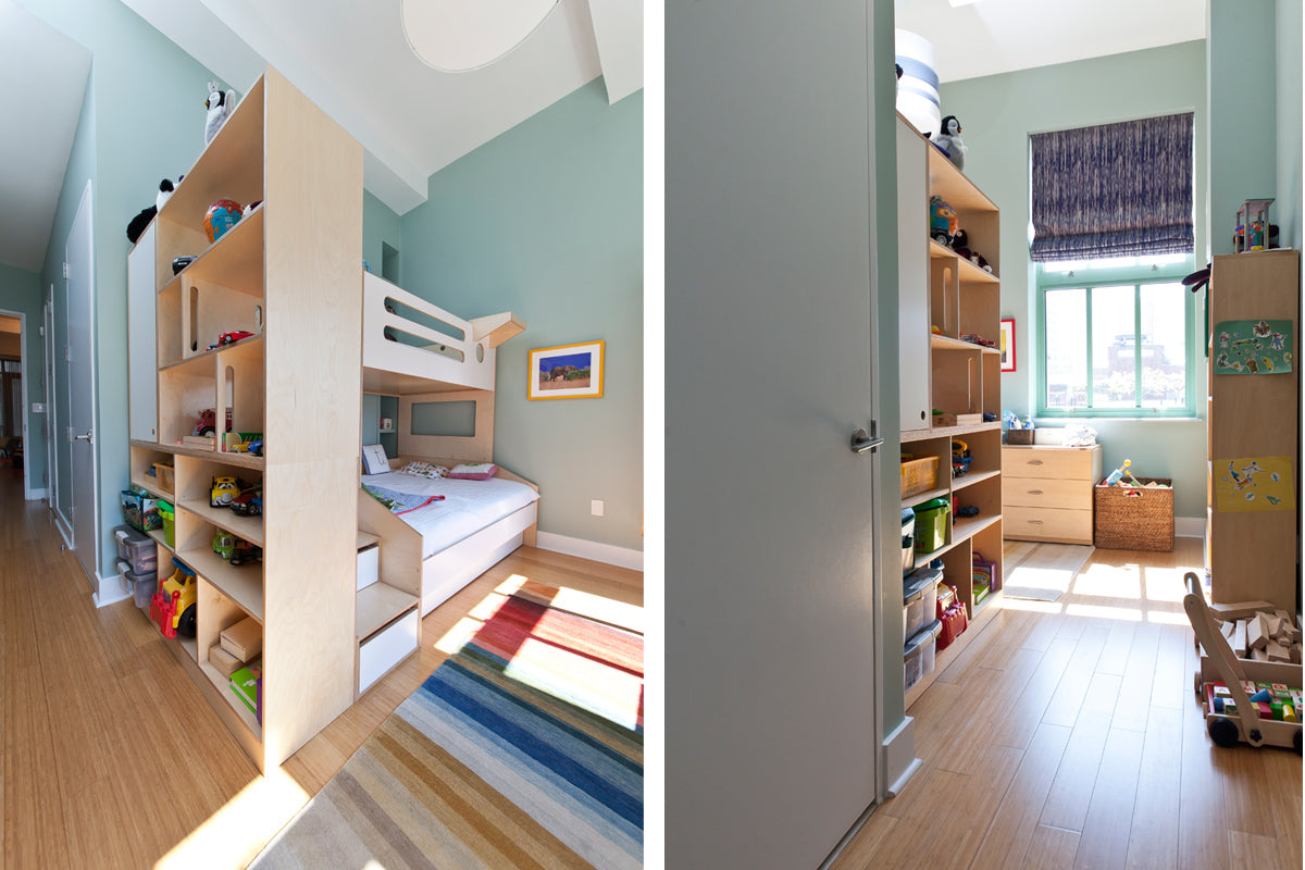 A child’s room with a bed, shelves, toys, and a striped rug. Bright and organized space.