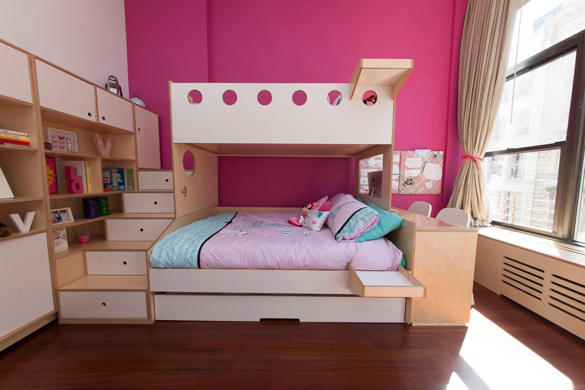 Pink room with bunk bed, storage, window.