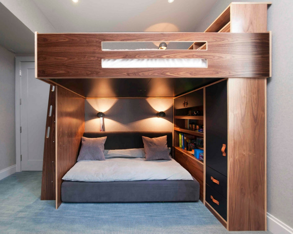 Wooden bunk bed with desk, shelves underneath, warm lights.