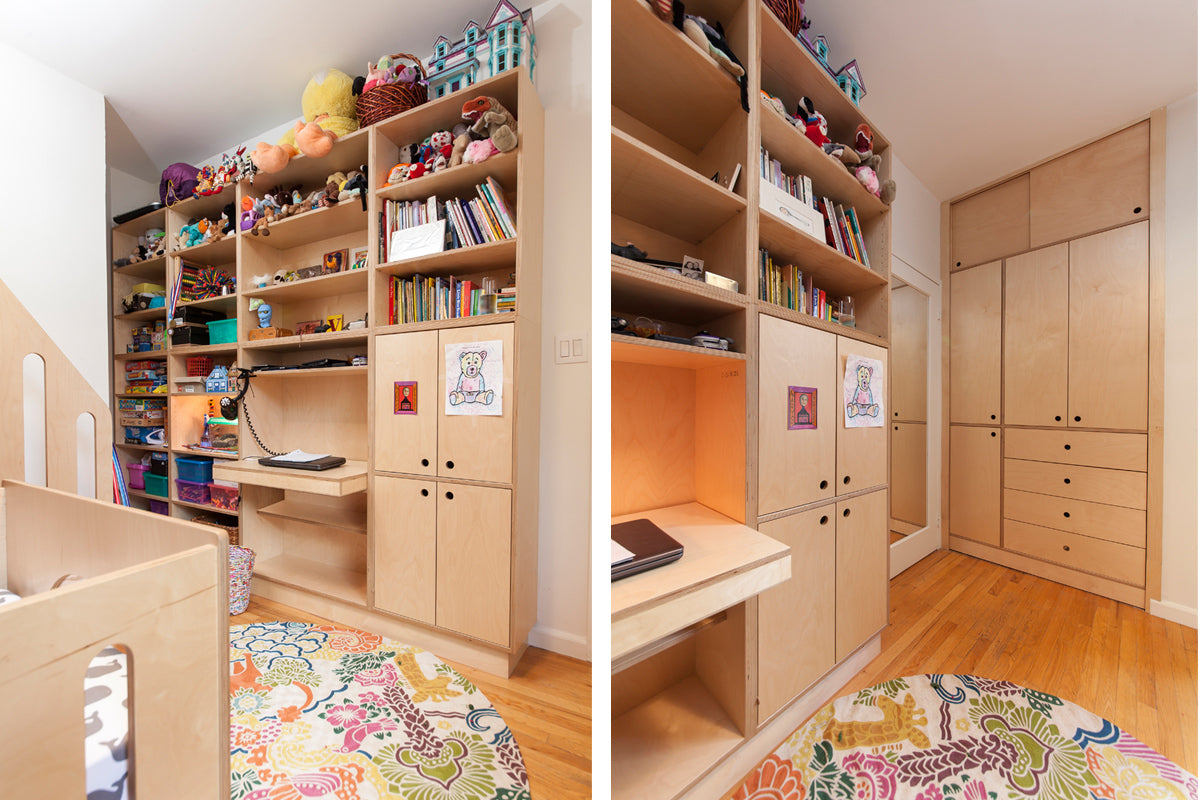 Well-organized child's room with a large bookshelf, storage cabinets, and a colorful rug.