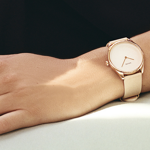 minimal watches for women with double-domed crystal case