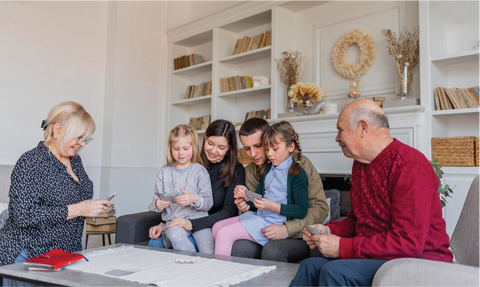 Grandfather and Grandmother palying with grandchild