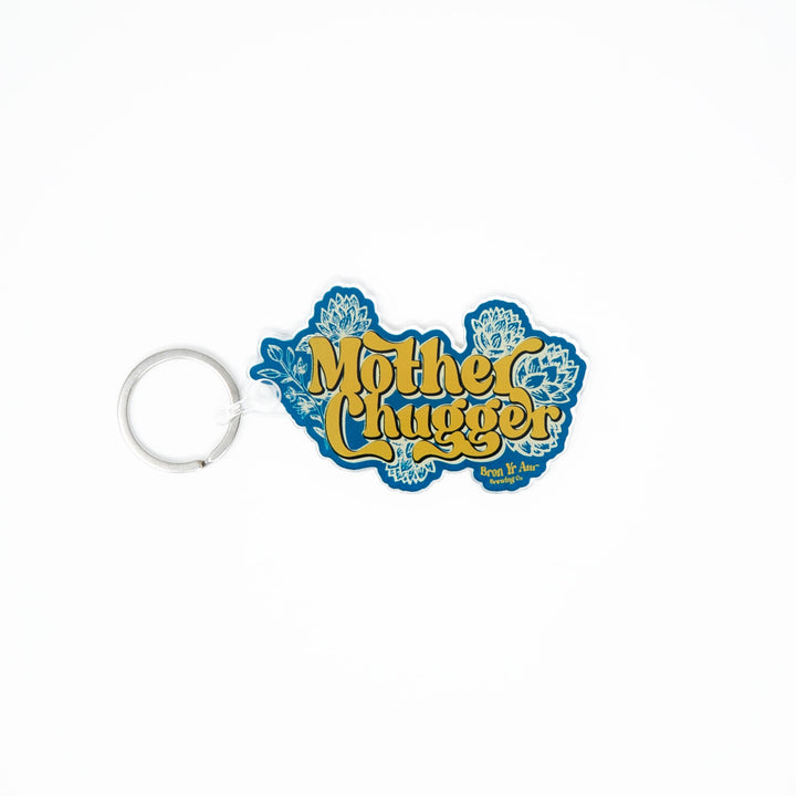 https://cdn.shopify.com/s/files/1/2730/2348/products/mother-chugger-keychain_720x.jpg?v=1633119702