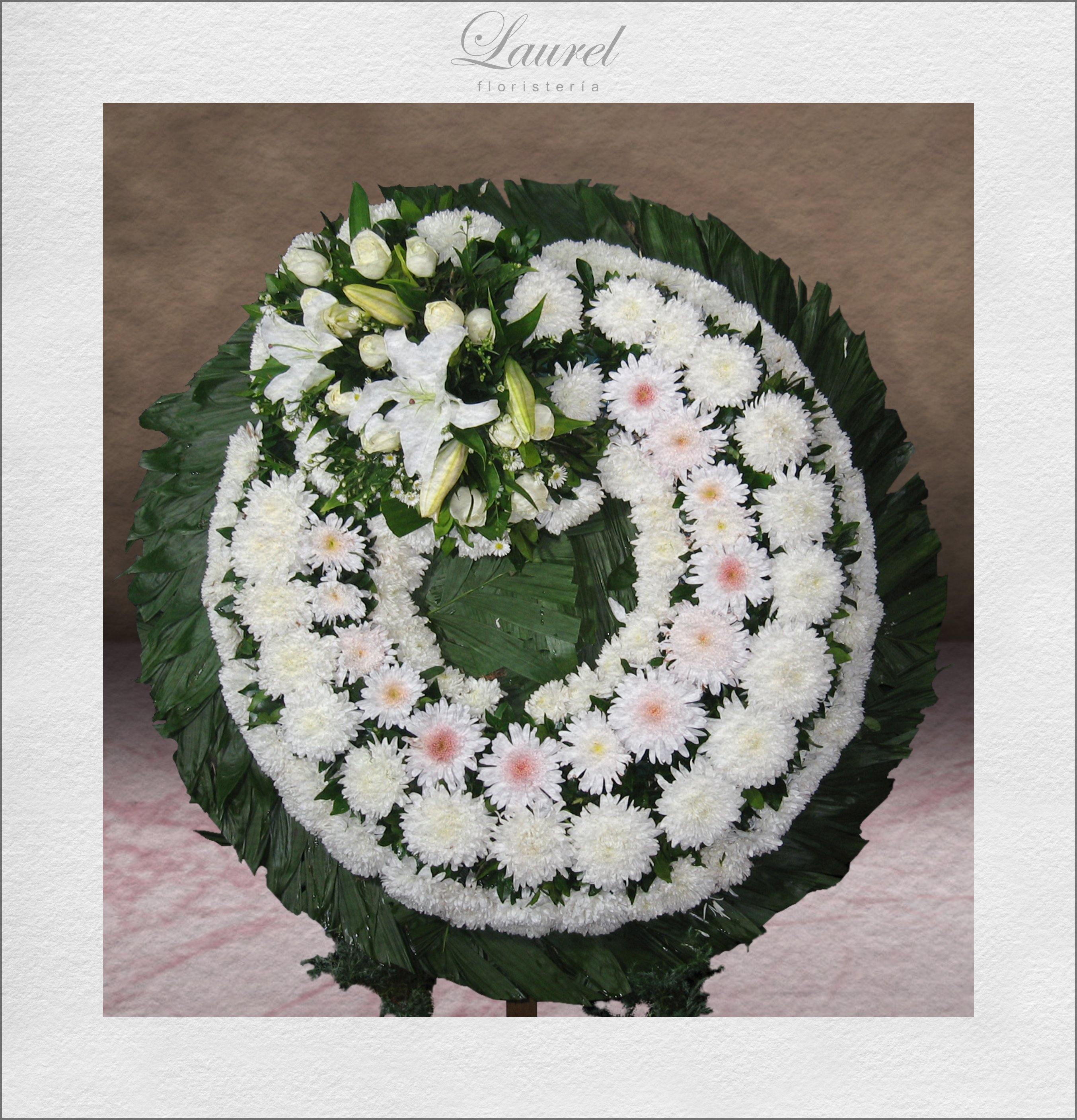 Corona de flores | REZO – Laurel Floristería