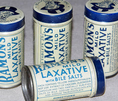 Vintage laxative tins from 1930s history of acne remedies by SLMD Skincare