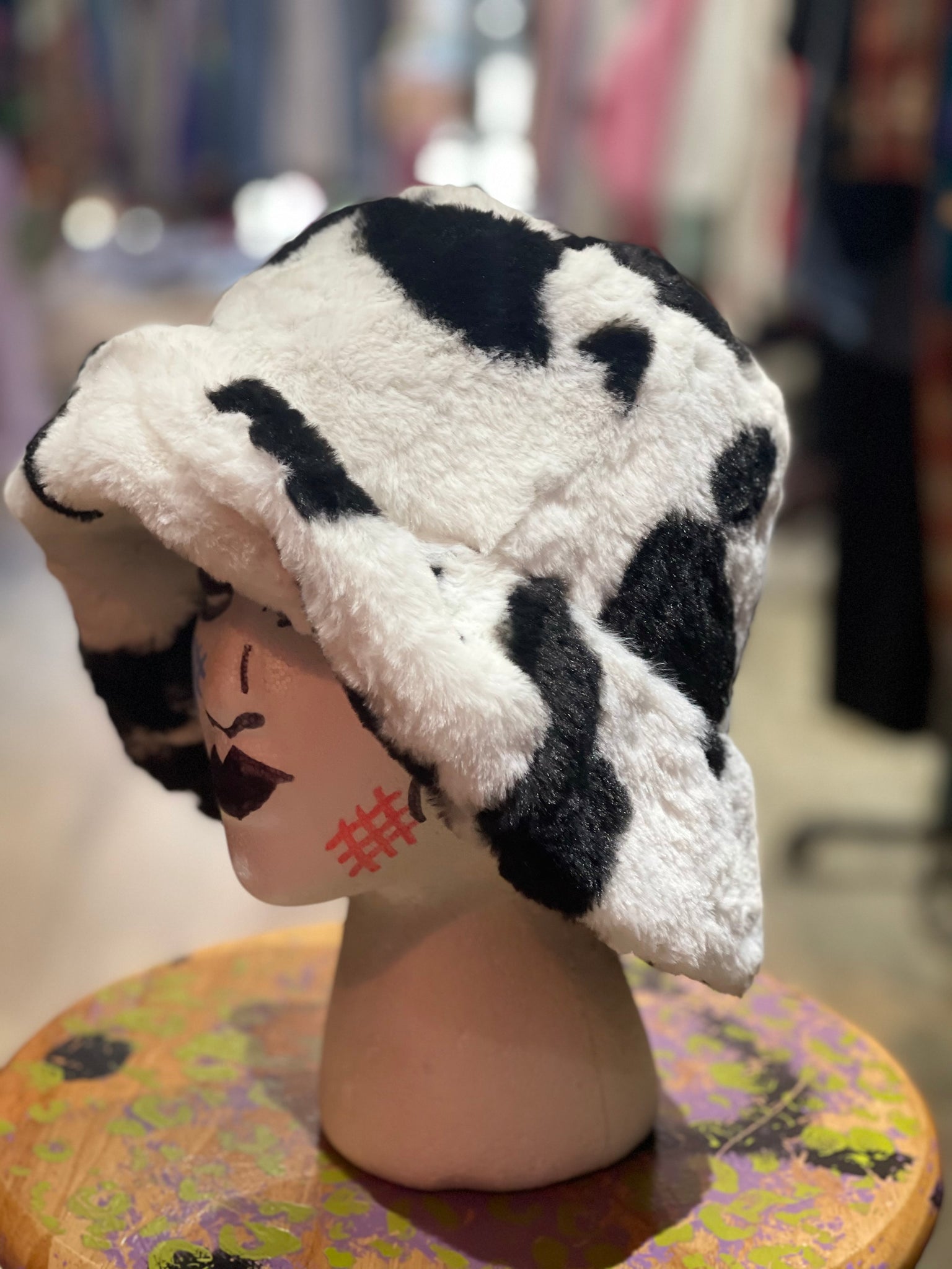 cow print fuzzy bucket hat