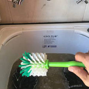 use a scrub brush to dislodge any loose dirt