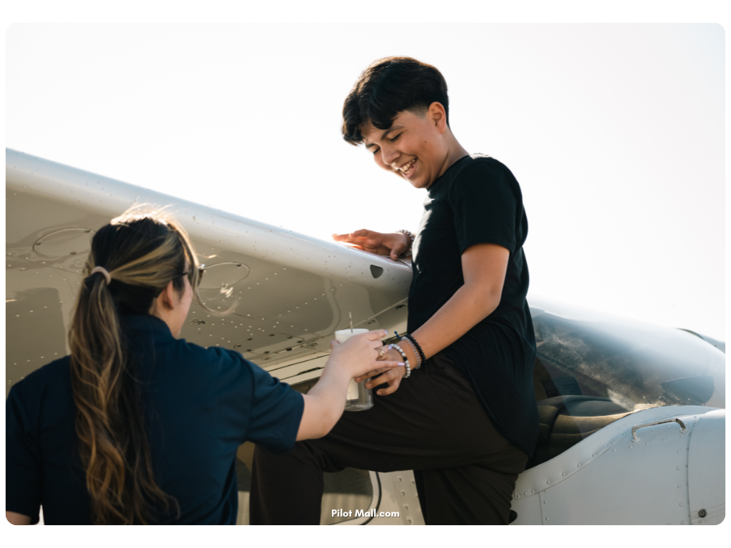 A CFI Teaching a Student About Checking the Fuel Tanks and Sumps