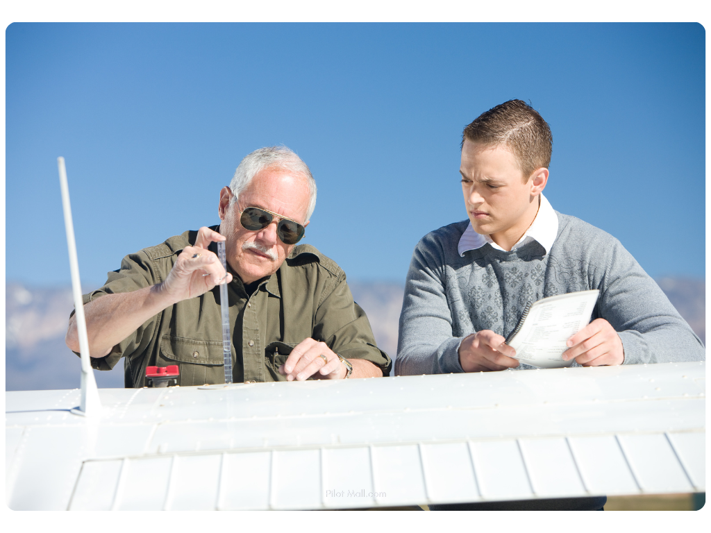 A Flight Instructor and Student Pilot Checking the Fuel - Pilot Mall