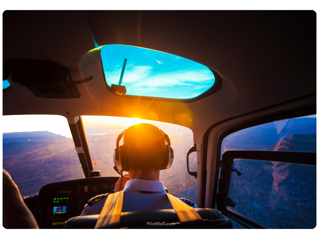 Una vista de la cabina del piloto desde un avión con cielos azules y nubes - Pilot Mall