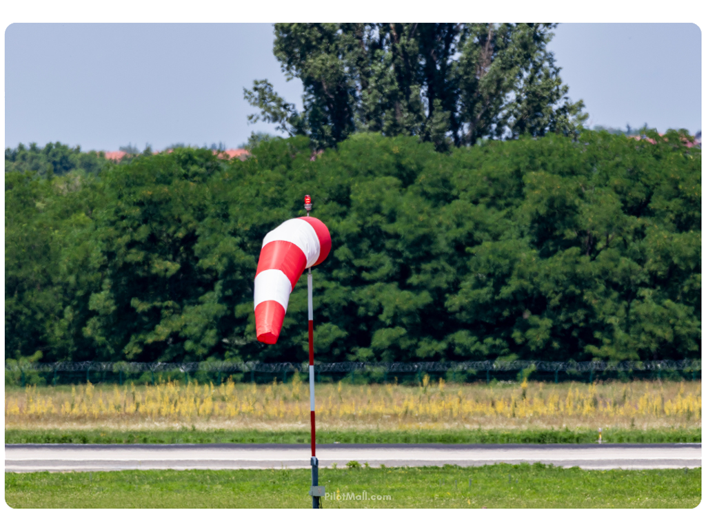 A Red and White Windsock at the Side of a Runway - Pilot Mall
