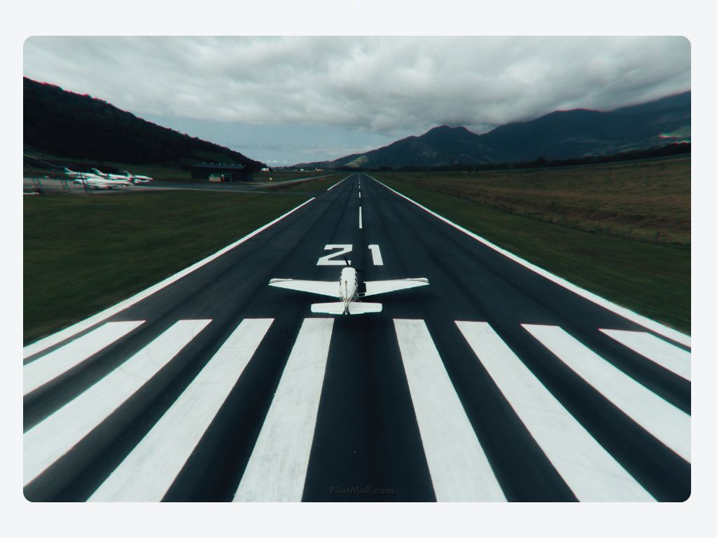 An aircraft at the start of a runway - Pilot Mall