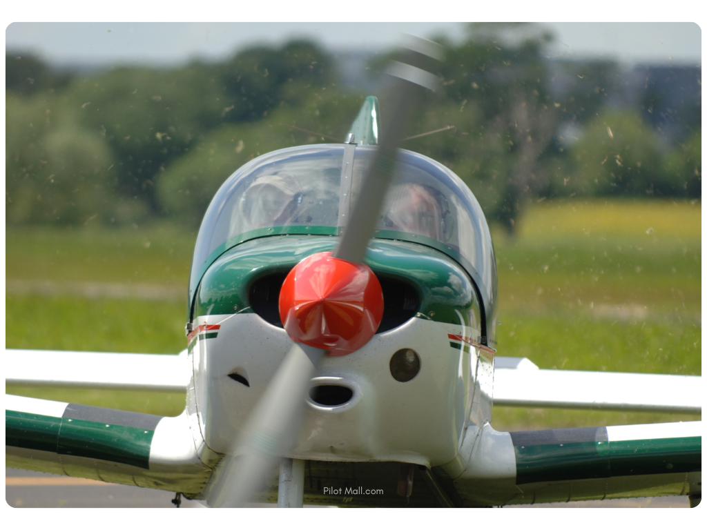 Closeup on an aircraft prop spinning - Pilot Mall