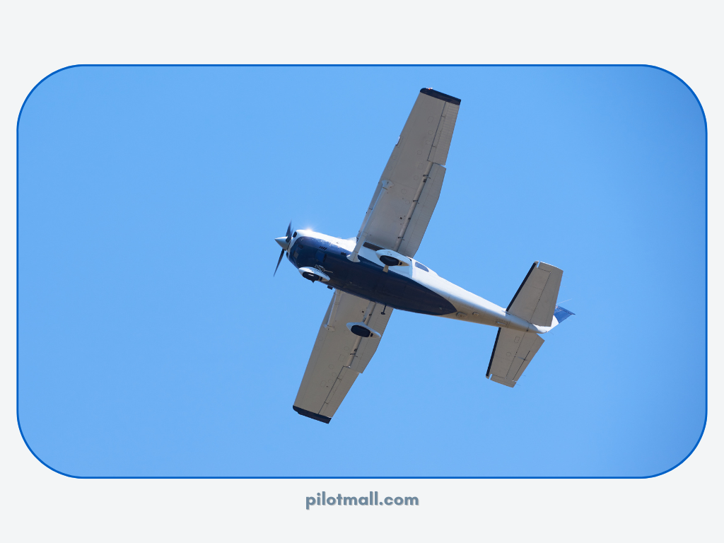 Looking up at a single engine aircraft in the sky - Pilot Mall