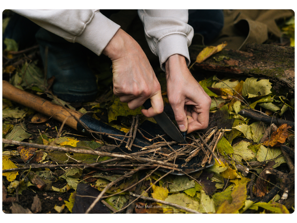 a survivalist trying to start a fire