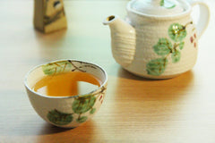 Green tea and teapot