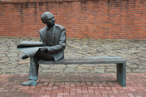 Statue of Man with Newspaper