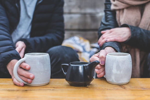 Two People Drinking Tea